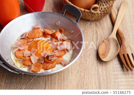 pan fried egg with toppings pan fried egg with toppings 35186275