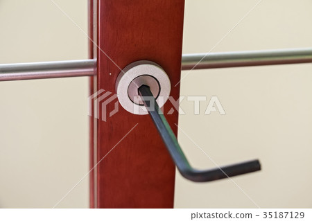 Assembling furniture with hex key 35187129