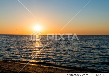 Beautiful sunset over sea 35187169