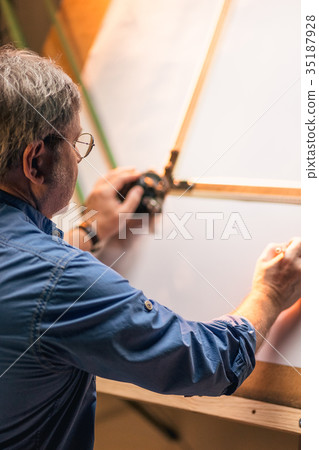 The mature creative engineer working with project 35187928