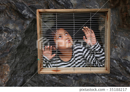 Asian girl children in the cage 35188217