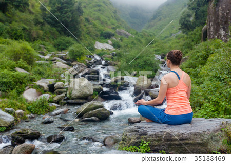 Woman doing yoga 35188469
