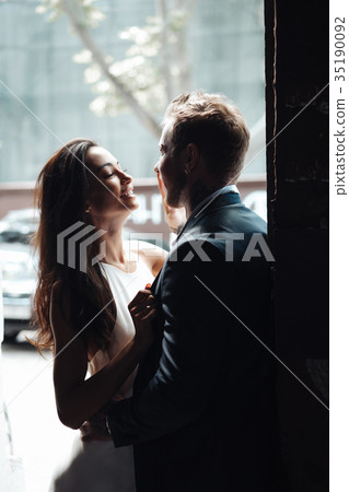 couple posing in the doorway 35190092