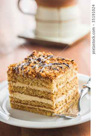 Cake with walnuts and honey. Cake with walnuts and honey. 35191024