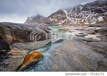 Rocky coast of fjord in Norway 35191272