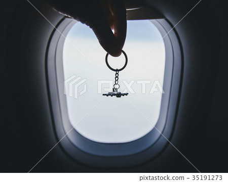 airplane model at the airplane window background airplane model at the airplane window background 35191273