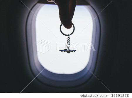 airplane model at the airplane window background airplane model at the airplane window background 35191278