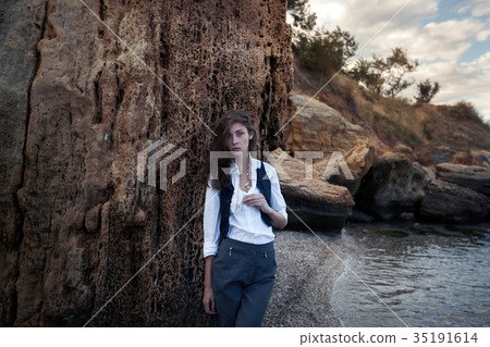 business woman on suit vest and white shirt business woman on suit vest and white shirt 35191614