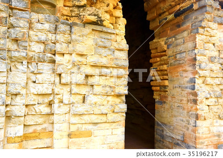 Old brick wall texture on the street 35196217