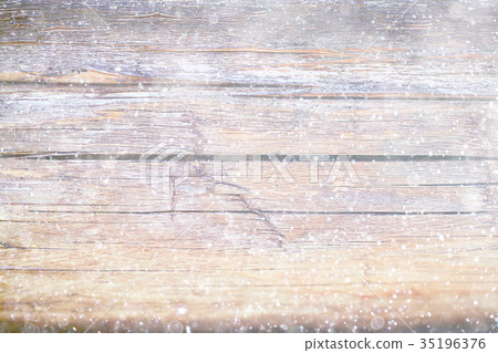 blurred wooden background with snow winter 35196376
