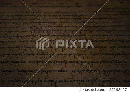Buddhist religious symbols inscriptions in Tibet old runes Buddhist religious symbols inscriptions in Tibet old runes 35198437