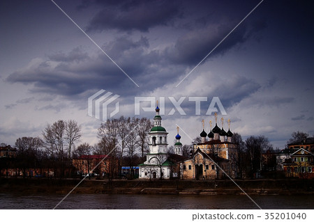 orthodox church river bank sky clouds 35201040