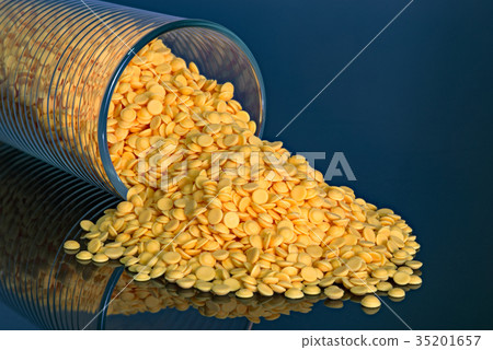 Plastic pellets, industrial beads blue background Plastic pellets, industrial beads blue background 35201657