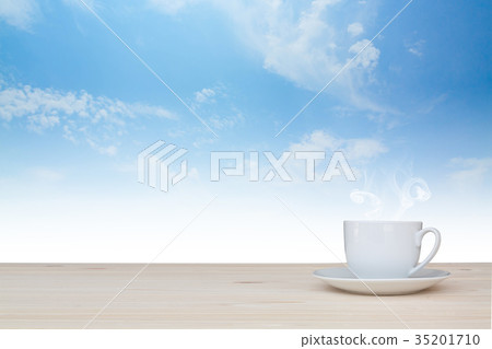 coffee cup on the table with beauty bule sky coffee cup on the table with beauty bule sky 35201710