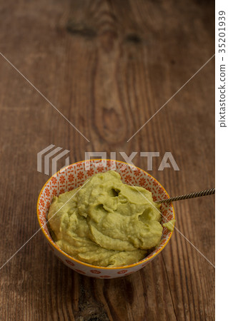 Avocado sauce in small bowl Avocado sauce in small bowl 35201939