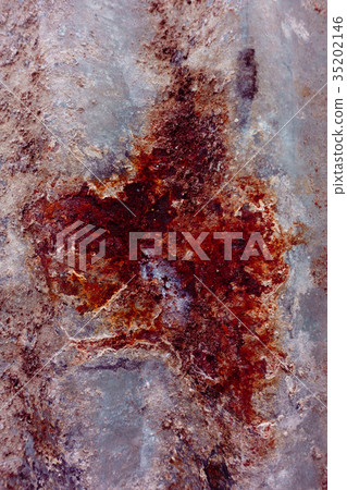The iron looks stable and rusty with scarlet scars The iron looks stable and rusty with scarlet scars 35202146