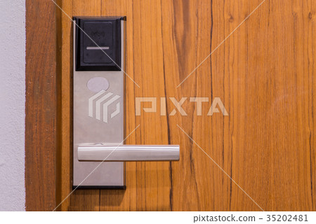 Electronic security key lock on wooden doo Electronic security key lock on wooden doo 35202481