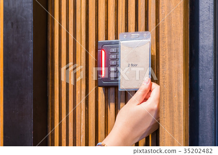 Electronic security key lock on wooden door Electronic security key lock on wooden door 35202482