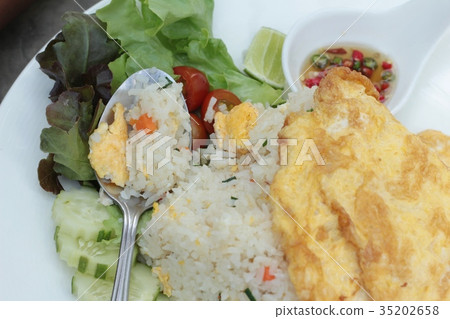 Fried rice with crab and omelet delicious. 35202658