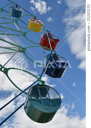 Ferris wheel in the summer Park. 35203235