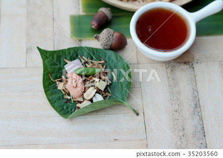 Miang Kham - leaf wrap appetizer is delicious. Miang Kham - leaf wrap appetizer is delicious. 35203560