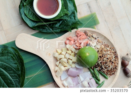 Miang Kham - leaf wrap appetizer is delicious. Miang Kham - leaf wrap appetizer is delicious. 35203570