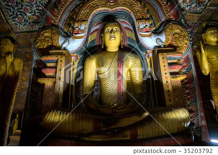 Buddha staue in cave temple in Dambulla Buddha staue in cave temple in Dambulla 35203792