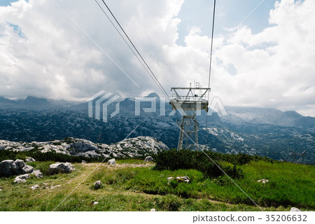 Scenic view of alps mountains a sunny day with Scenic view of alps mountains a sunny day with 35206632