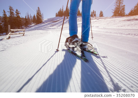 Walking in the snow. 35208070