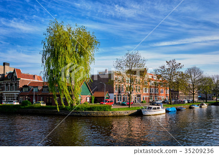 Boats, houses and canal. Harlem, Netherlands 35209236