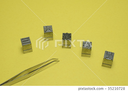 Letterpress and tweezers 35210728