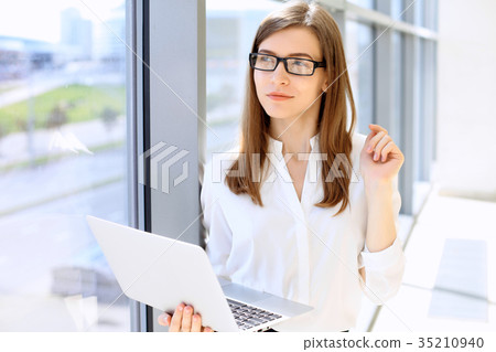 Portrait of modern business woman  working wit 35210940