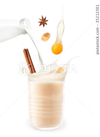 eggnog with splash isolated on white 35212301