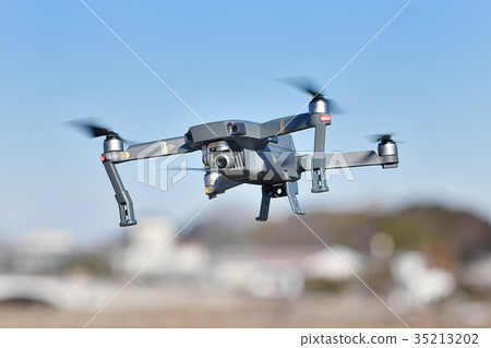 Compact drone in flight 35213202