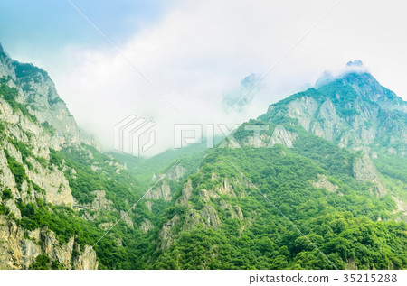Beautiful view of green Ossetian mountain peak Beautiful view of green Ossetian mountain peak 35215288