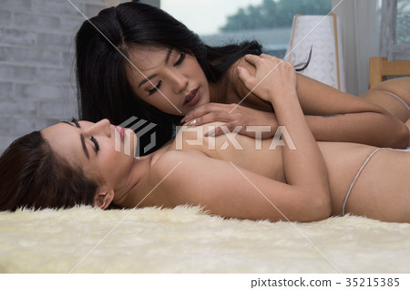 Portrait of young woman brunette with beautiful nude topless bre 35215385