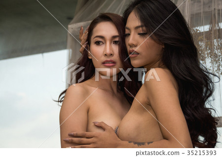 Portrait of young woman brunette with beautiful nude topless bre 35215393