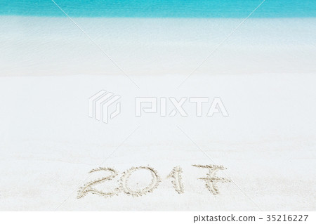 2017 inscription written on sandy beach 2017 inscription written on sandy beach 35216227