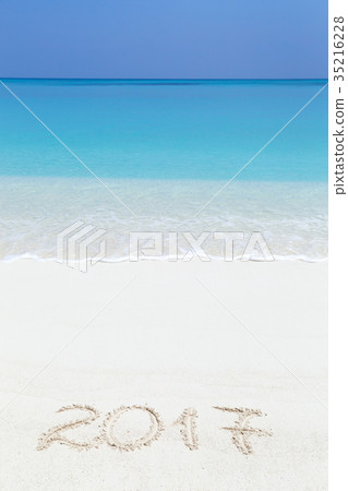 2017 inscription written on sandy beach 2017 inscription written on sandy beach 35216228