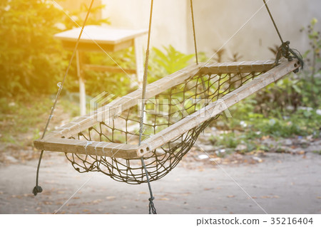 Local Maldivian seats hanging on tree 35216404