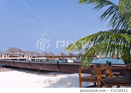 Tropical travel destination with pristine beach 35216412