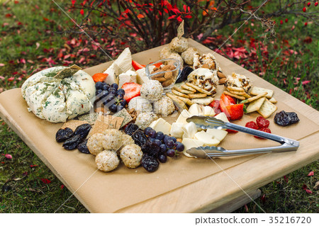 Delicious cheese on the table. 35216720