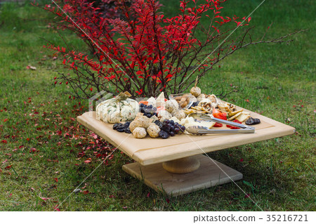 Delicious cheese on the table. Delicious cheese on the table. 35216721