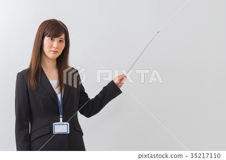 Young woman business pointing hand Young woman business pointing hand 35217110