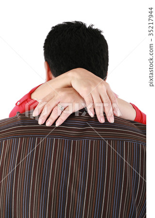 Woman hugging her husband with love Woman hugging her husband with love 35217944