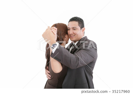 young couple dancing over white background 35217960