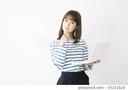 A woman watching a smartphone A woman watching a smartphone 35221828