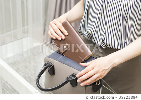 Business woman getting ready Business woman getting ready 35223884