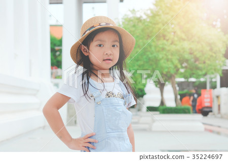 Asian girl wearing hat and dress pose fashion 35224697