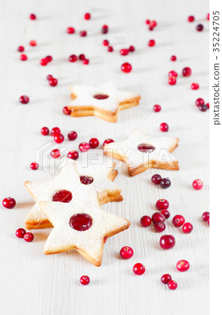 Traditional Linzer cookies - stars with red jam 35224705
